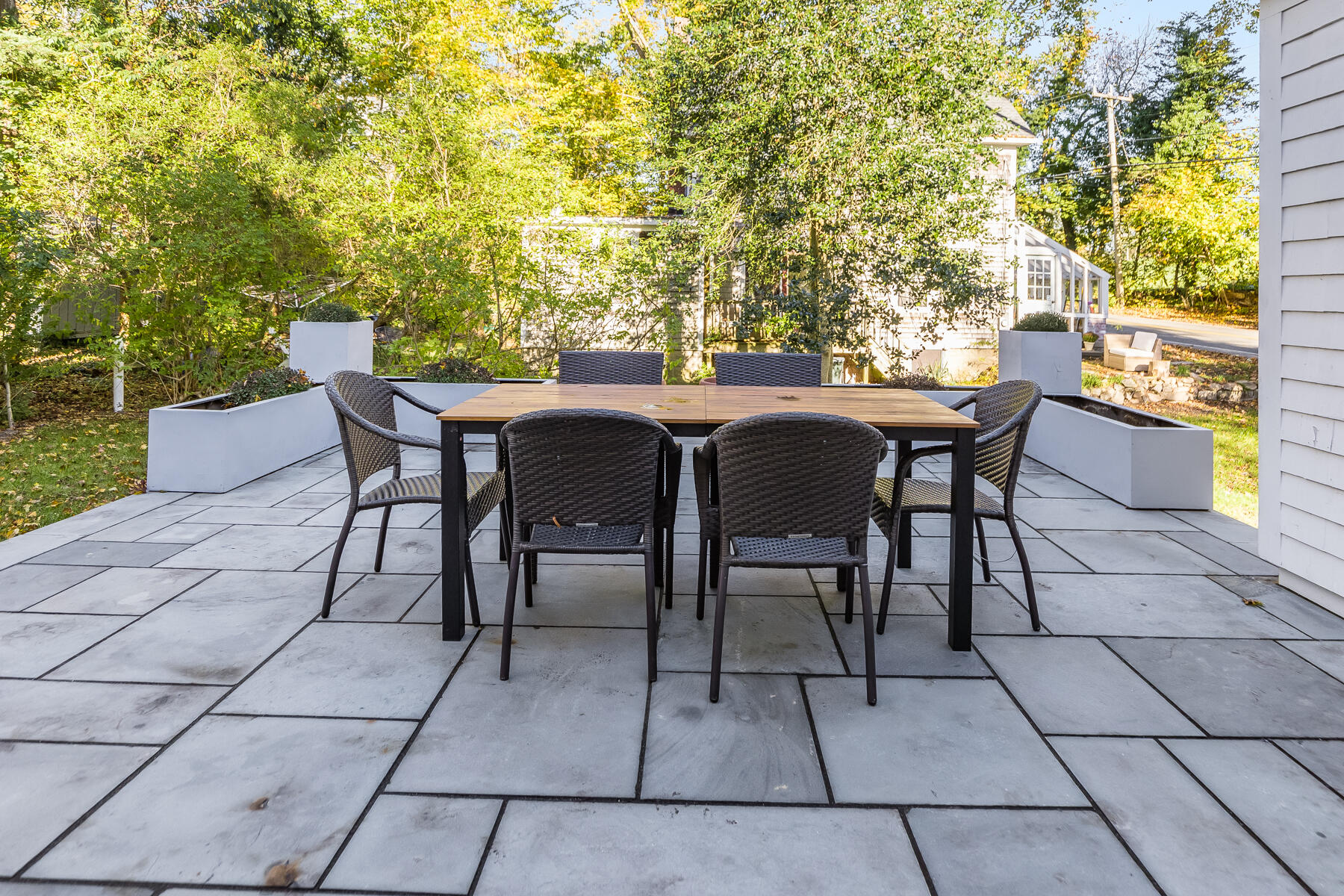 3 High Street Falmouth, MA 02543 - Photo 45 of 52 a view of a patio with table and chairs