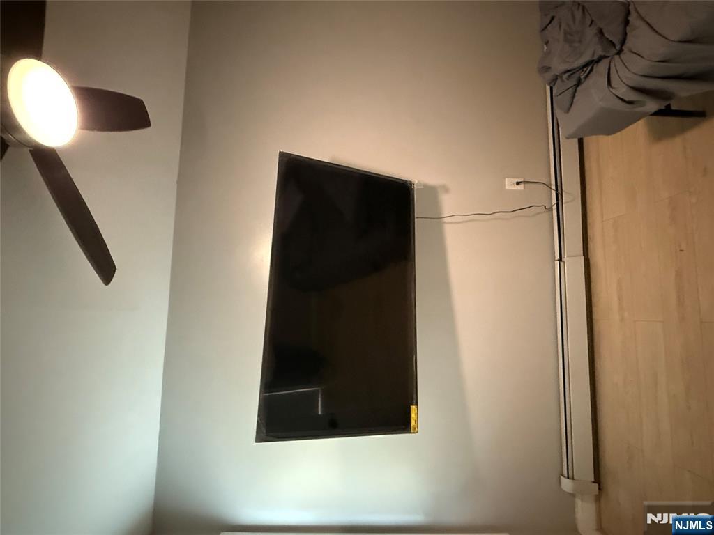 753 South 11th Street, Unit 1 Newark, NJ 07103 - Photo 5 of 17 a living room with a couch