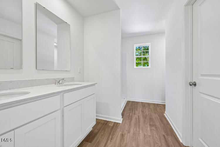 10955 Lancaster Store Road Castalia, NC 27816 - Photo 17 of 20 a bathroom with a sink and a mirror
