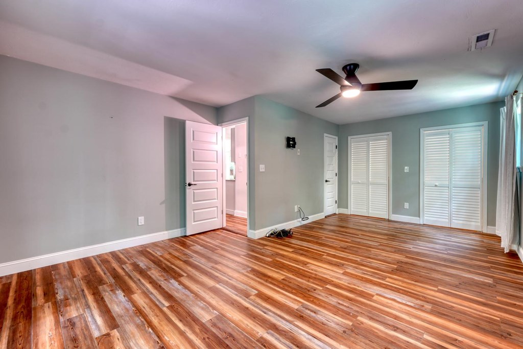 45 Mountain Stream Road Murphy, NC 28906 - Photo 7 of 33 a view of an empty room with window and wooden floor
