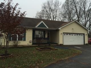 46 Bristol Ridge Road Bristol, IL 60512 - Photo 1 of 12 a front view of a house with a garden
