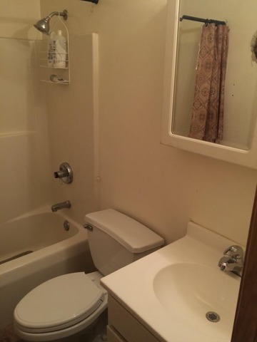 46 Bristol Ridge Road Bristol, IL 60512 - Photo 7 of 12 a bathroom with a sink and a toilet