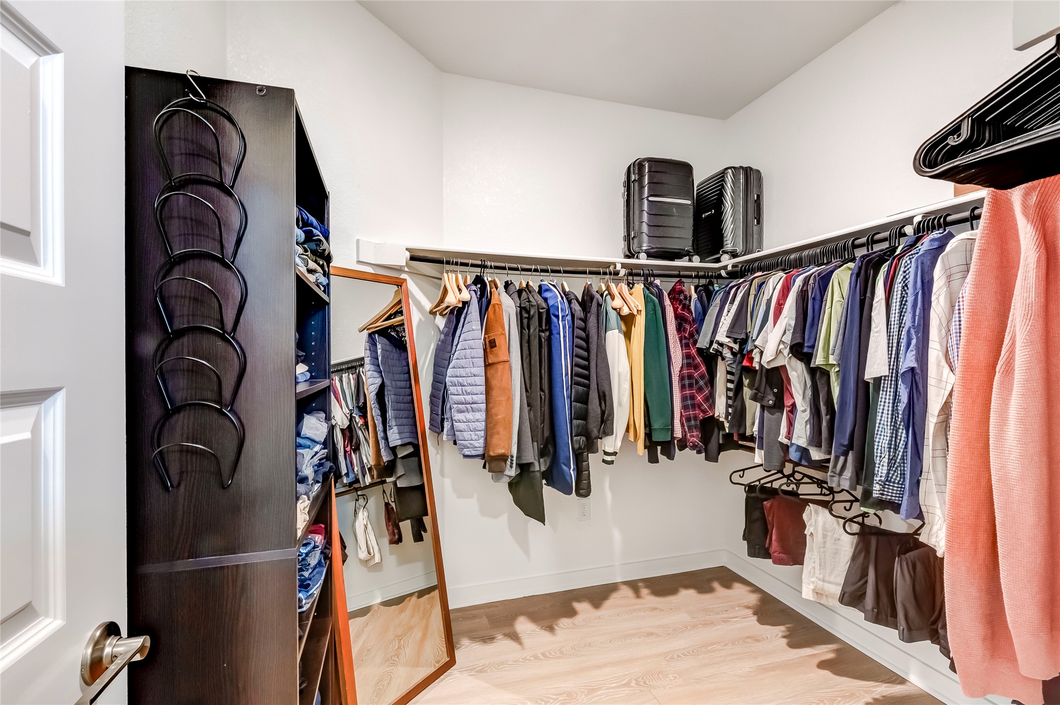 917 Balsora Cove Georgetown, TX 78628 - Photo 25 of 39 Walk in closet with light wood-style floors