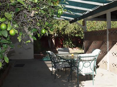 780 South Rice Road Ojai, CA 93023 - Photo 14 of 20 a view of a patio with table and chairs and potted plants