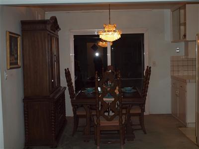 780 South Rice Road Ojai, CA 93023 - Photo 6 of 20 a view of a dining room with furniture and chandelier