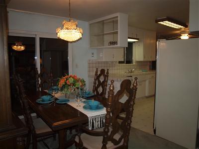 780 South Rice Road Ojai, CA 93023 - Photo 7 of 20 a dining room with furniture and chandelier