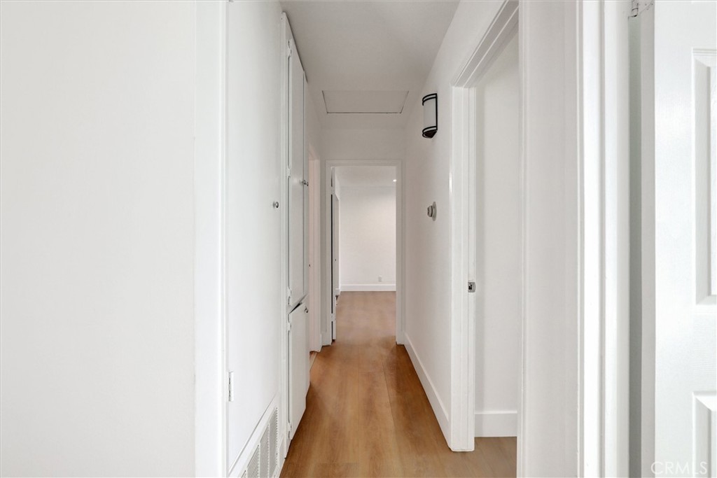 17282 Chestnut Irvine, CA 92612 - Photo 8 of 31 a view of a hallway with a white walls