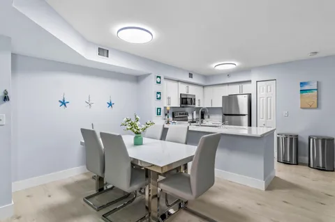 a view of kitchen with dining area