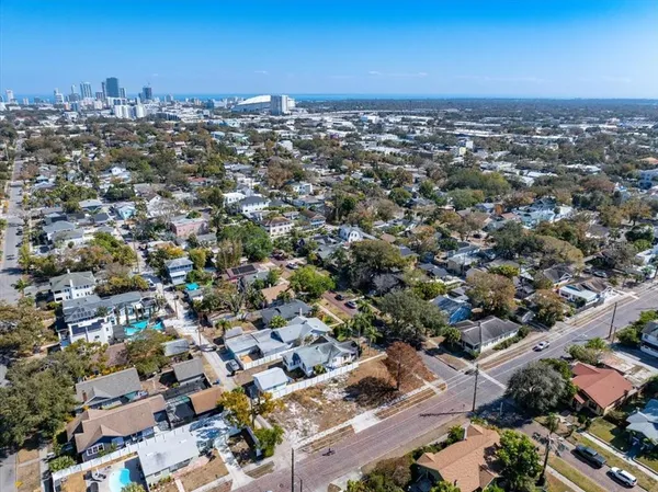 an aerial view of a city with lots of residential buildings