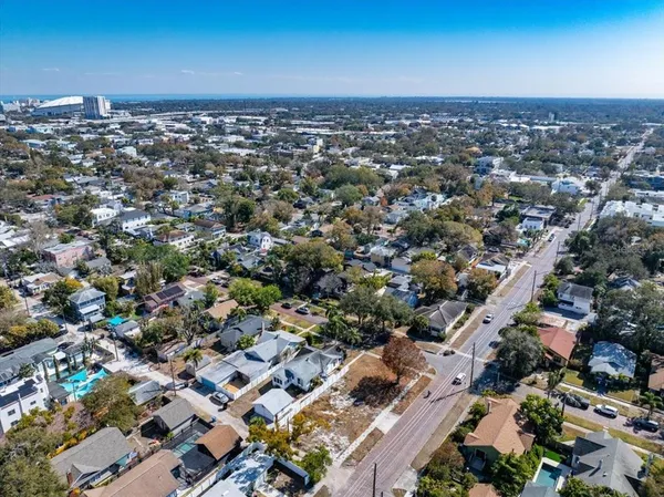 an aerial view of a city with lots of residential buildings
