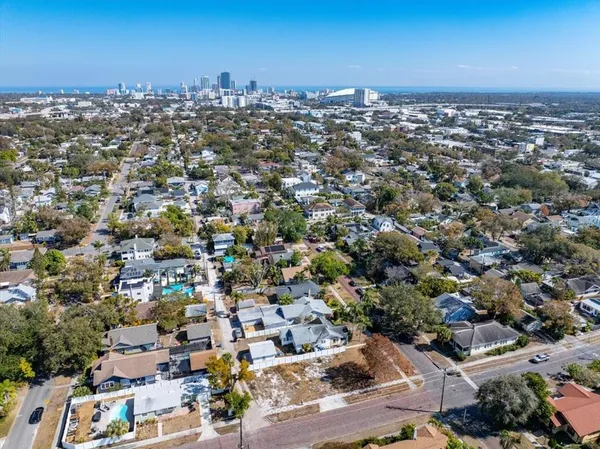 an aerial view of a city with lots of residential buildings