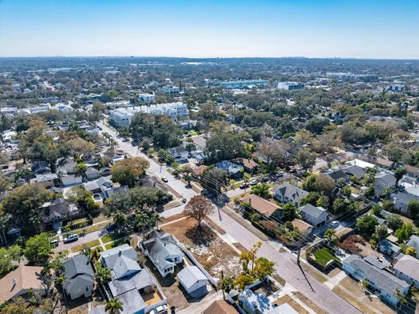 an aerial view of a city with lots of residential buildings