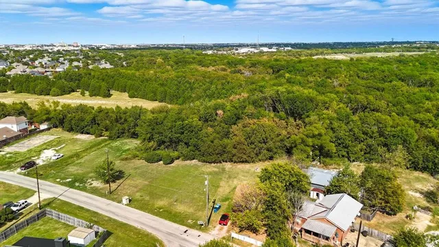 a view of a yard with an outdoor space