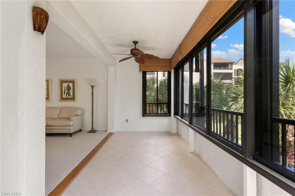 6500 Valen Way, Unit A203 Naples, FL 34108 - Photo 14 of 28 a view of hallway with livingroom and furniture