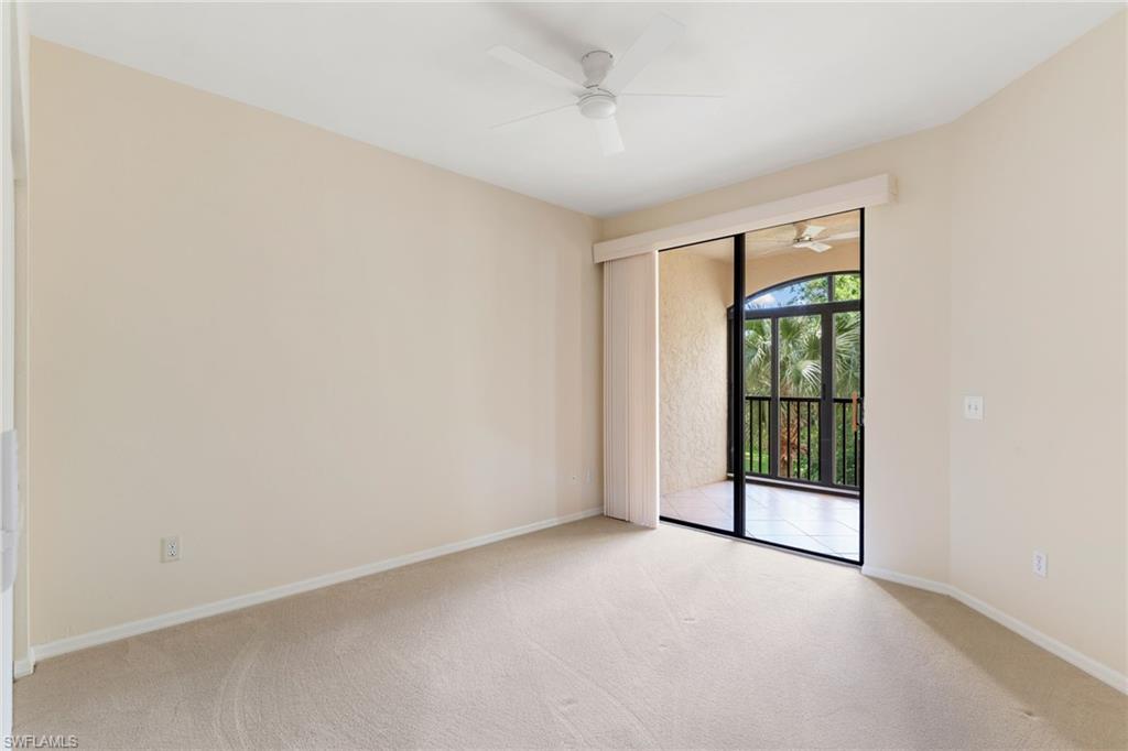 6500 Valen Way, Unit A203 Naples, FL 34108 - Photo 16 of 28 a view of an empty room with a window
