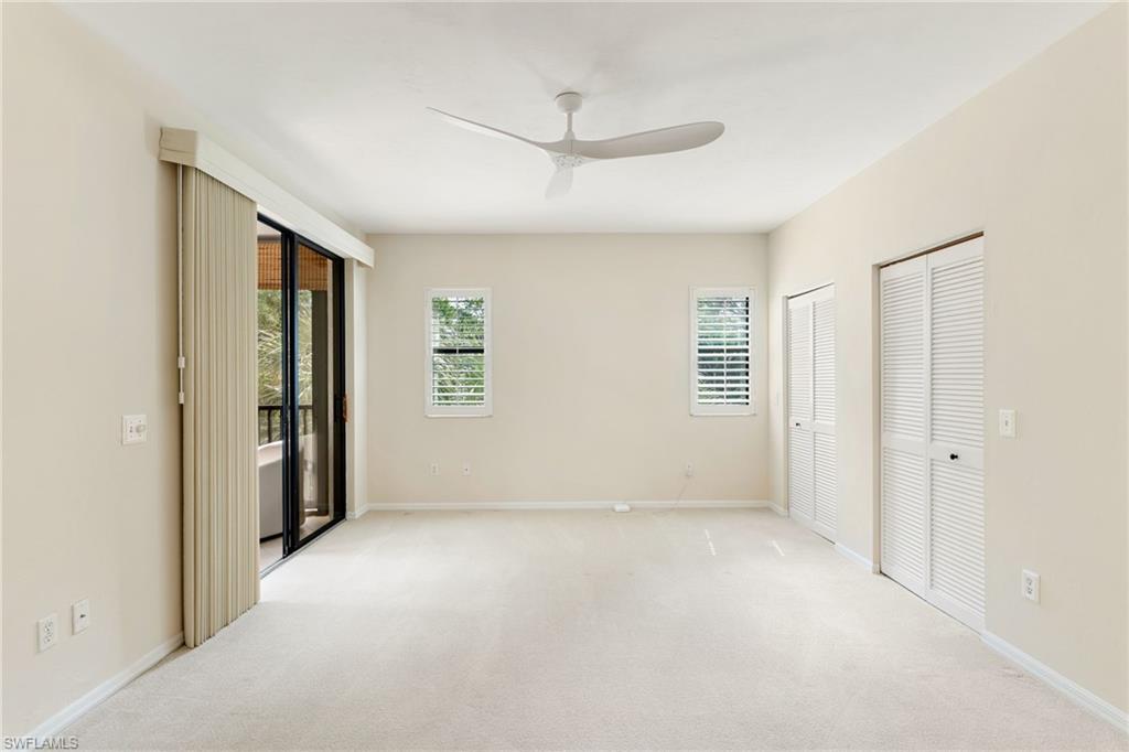 6500 Valen Way, Unit A203 Naples, FL 34108 - Photo 18 of 28 a view of an empty room with a window