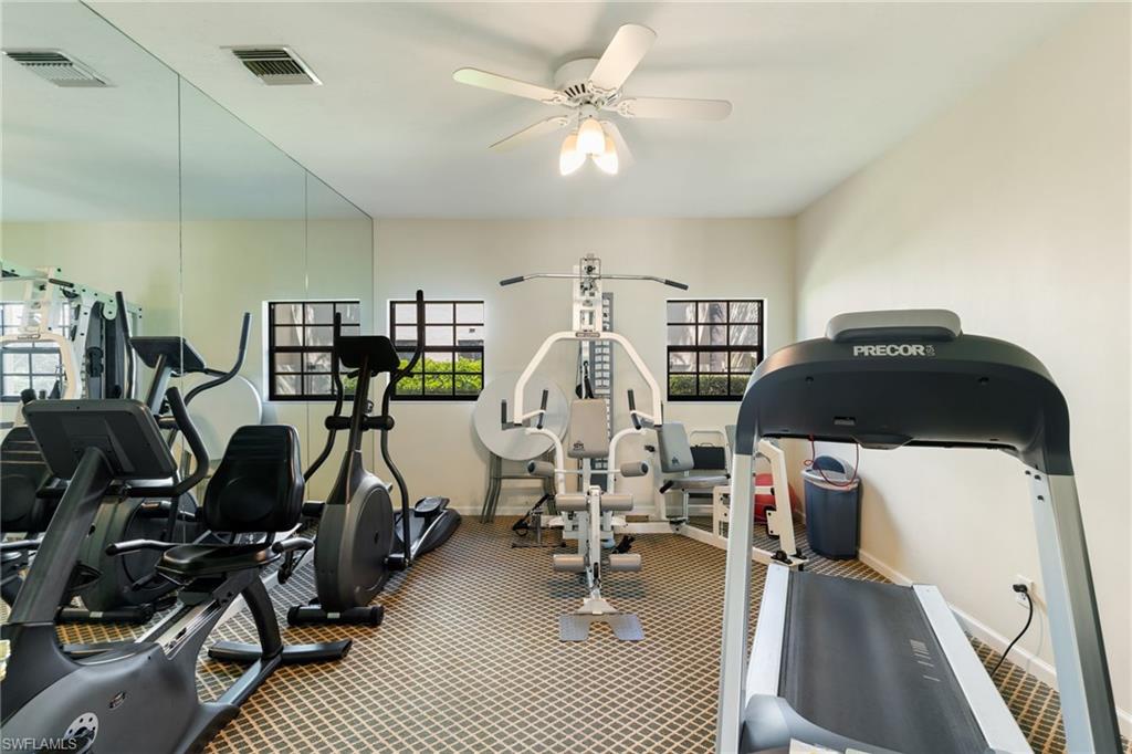 6500 Valen Way, Unit A203 Naples, FL 34108 - Photo 25 of 28 a view of a room with gym equipment