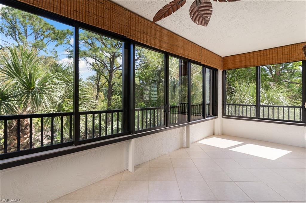 6500 Valen Way, Unit A203 Naples, FL 34108 - Photo 5 of 28 a view of an empty room with a large window