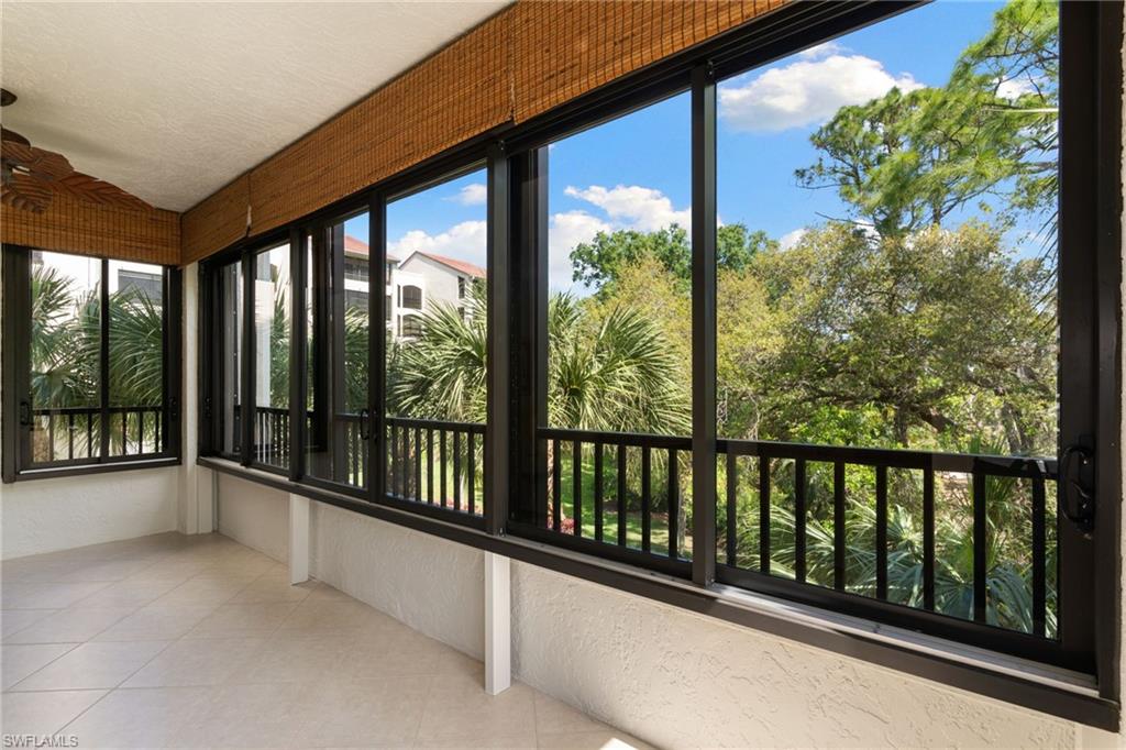 6500 Valen Way, Unit A203 Naples, FL 34108 - Photo 8 of 28 a view of a porch with a large window