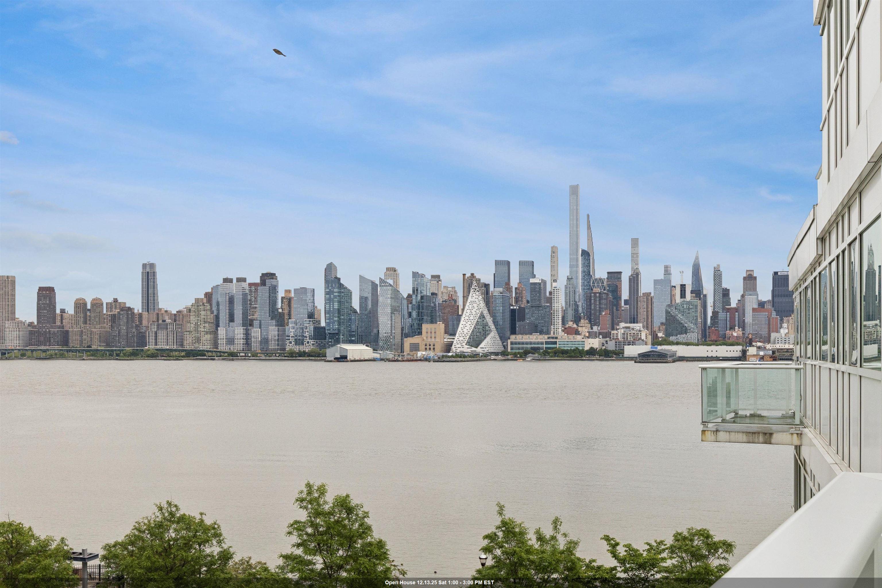 a view of a city with tall buildings in the background