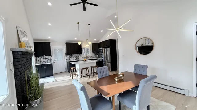 a view of a dining room with furniture window and outside view