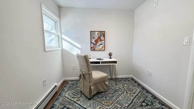 a living room with a couch and a table