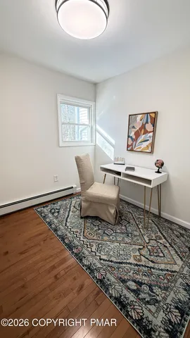 a bedroom with bed and window