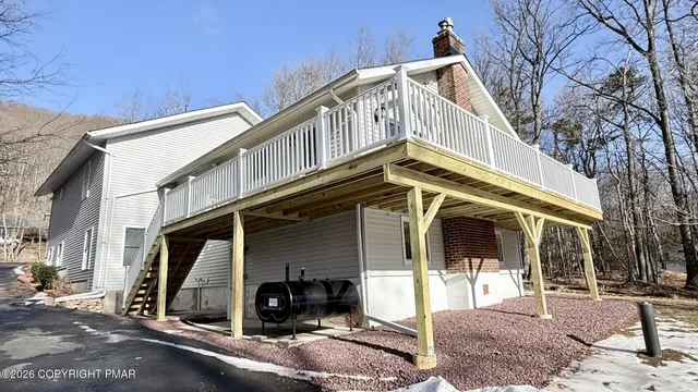 a view of a house with a street