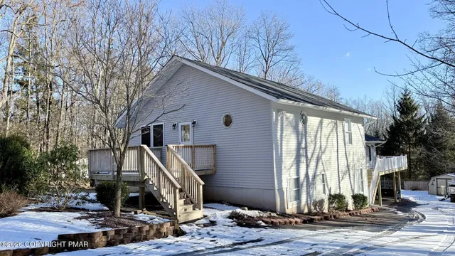 a front view of house with street view