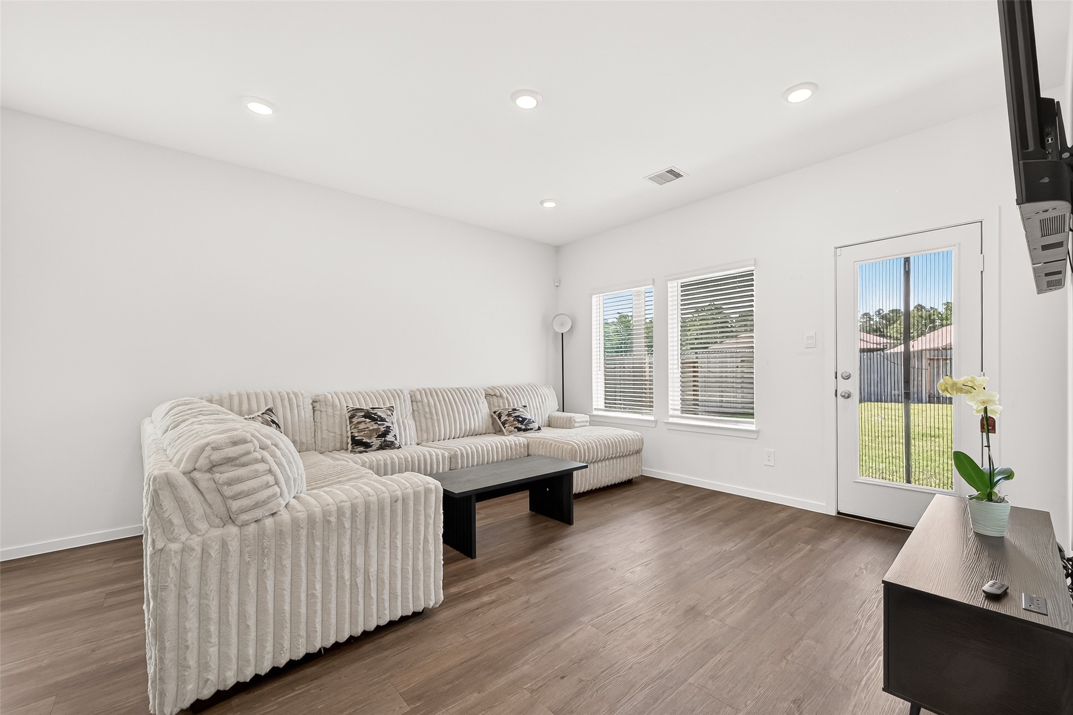 5442 Pinetree Cres Lane Spring, TX 77373 - Photo 24 of 24 The open concept floor plan creates an inviting living space, seamlessly connecting the kitchen, dining and living areas for effortless everyday living and entertaining