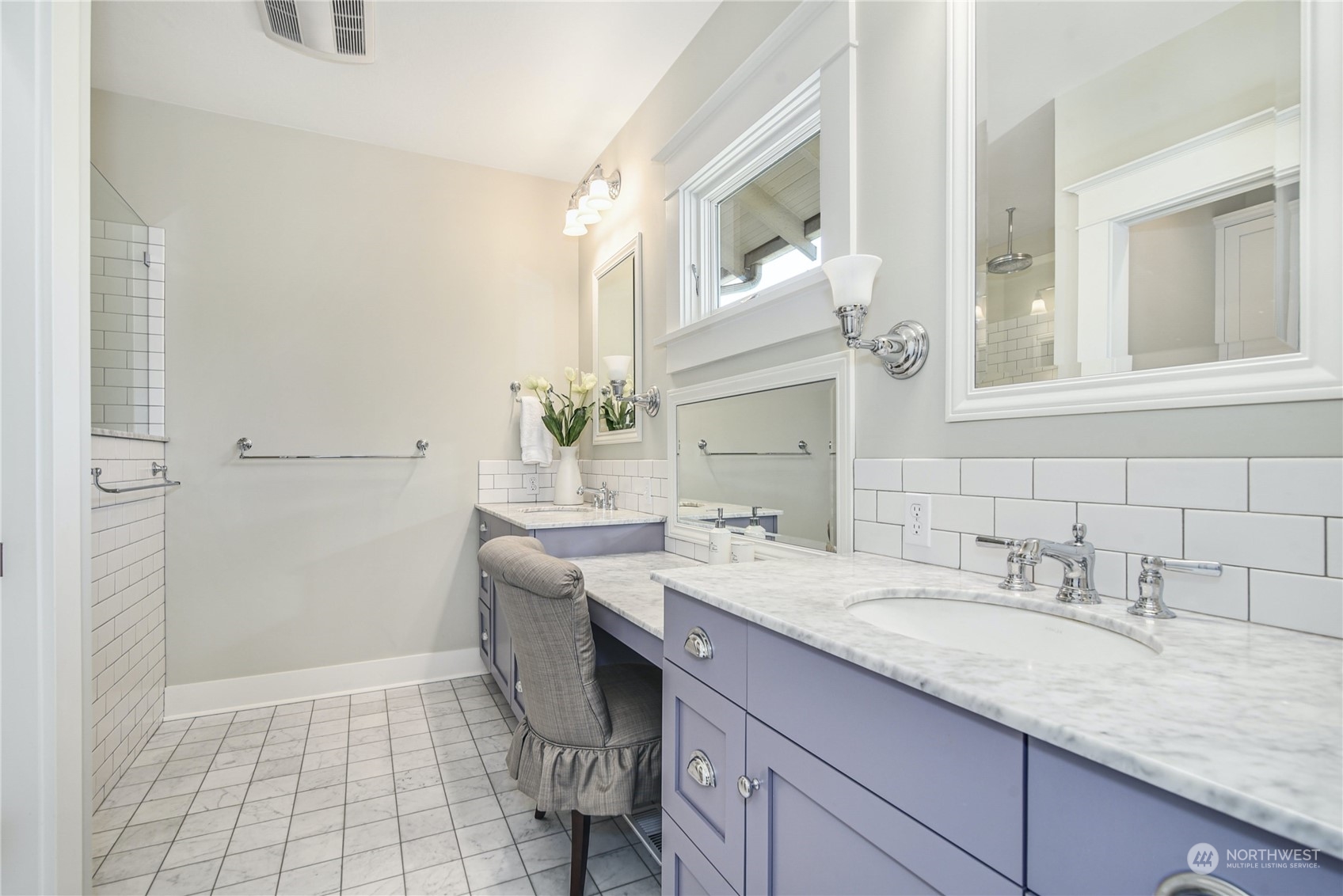 1249 18th Avenue East Seattle, WA 98112 - Photo 21 of 39 a bathroom with a granite countertop sink and a mirror