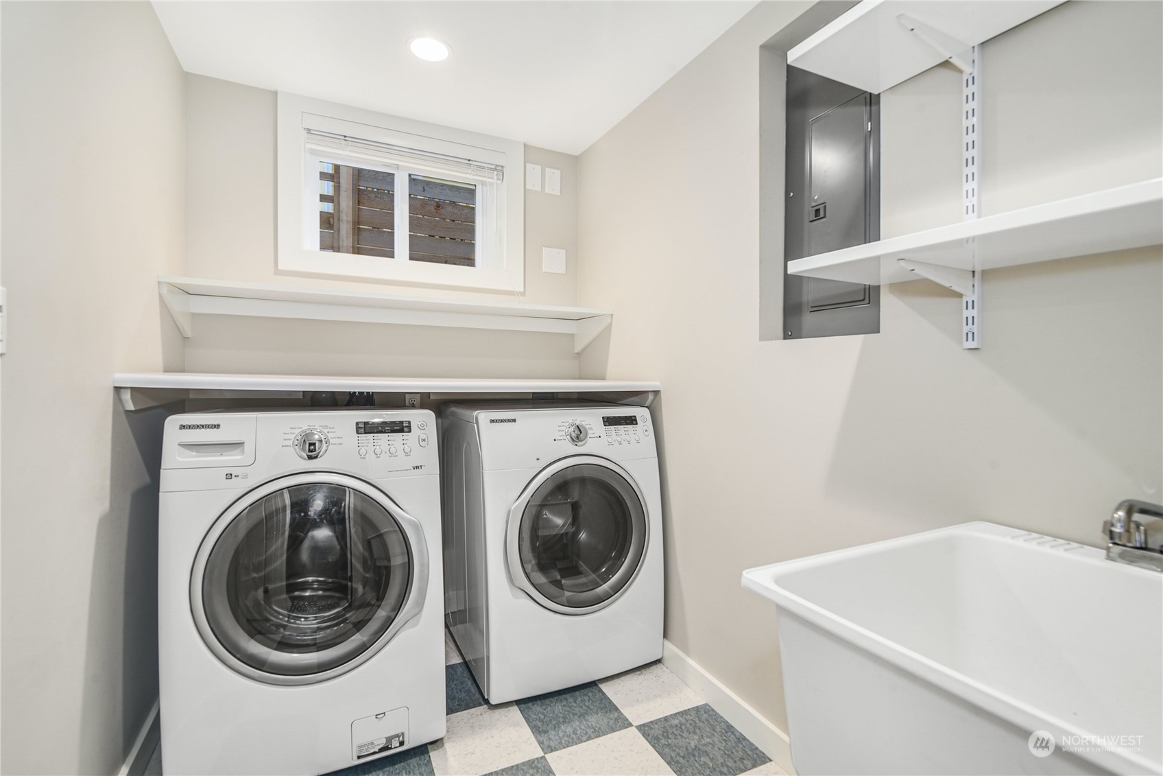 1249 18th Avenue East Seattle, WA 98112 - Photo 33 of 39 a utility room with dryer and washer