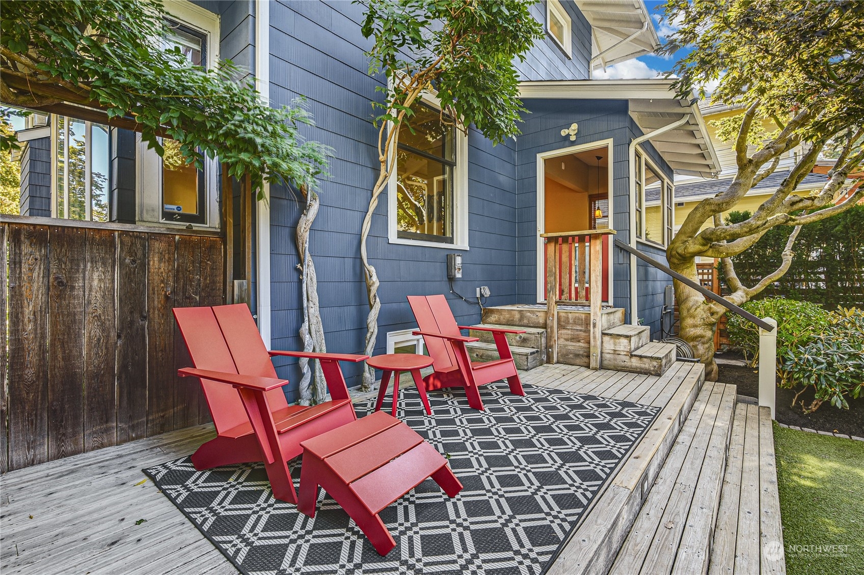 1249 18th Avenue East Seattle, WA 98112 - Photo 35 of 39 a view of a chairs with a table in the patio
