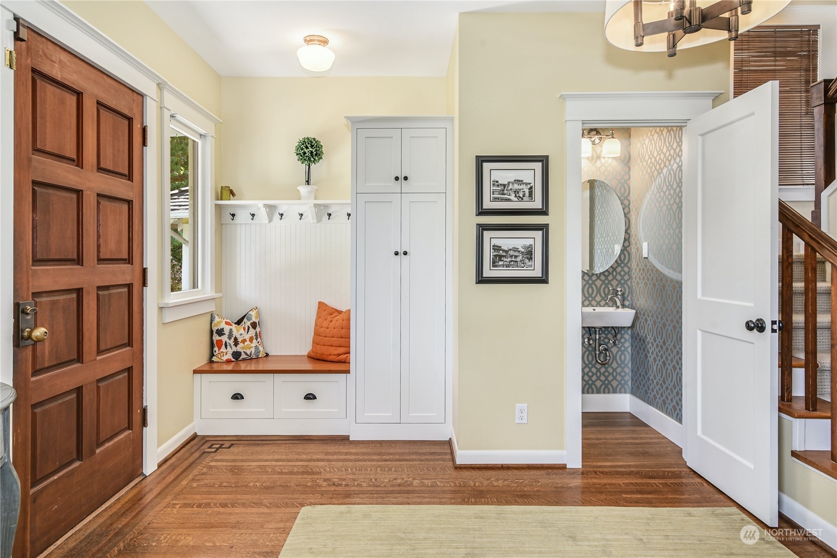 1249 18th Avenue East Seattle, WA 98112 - Photo 5 of 39 a view of a hallway with front door