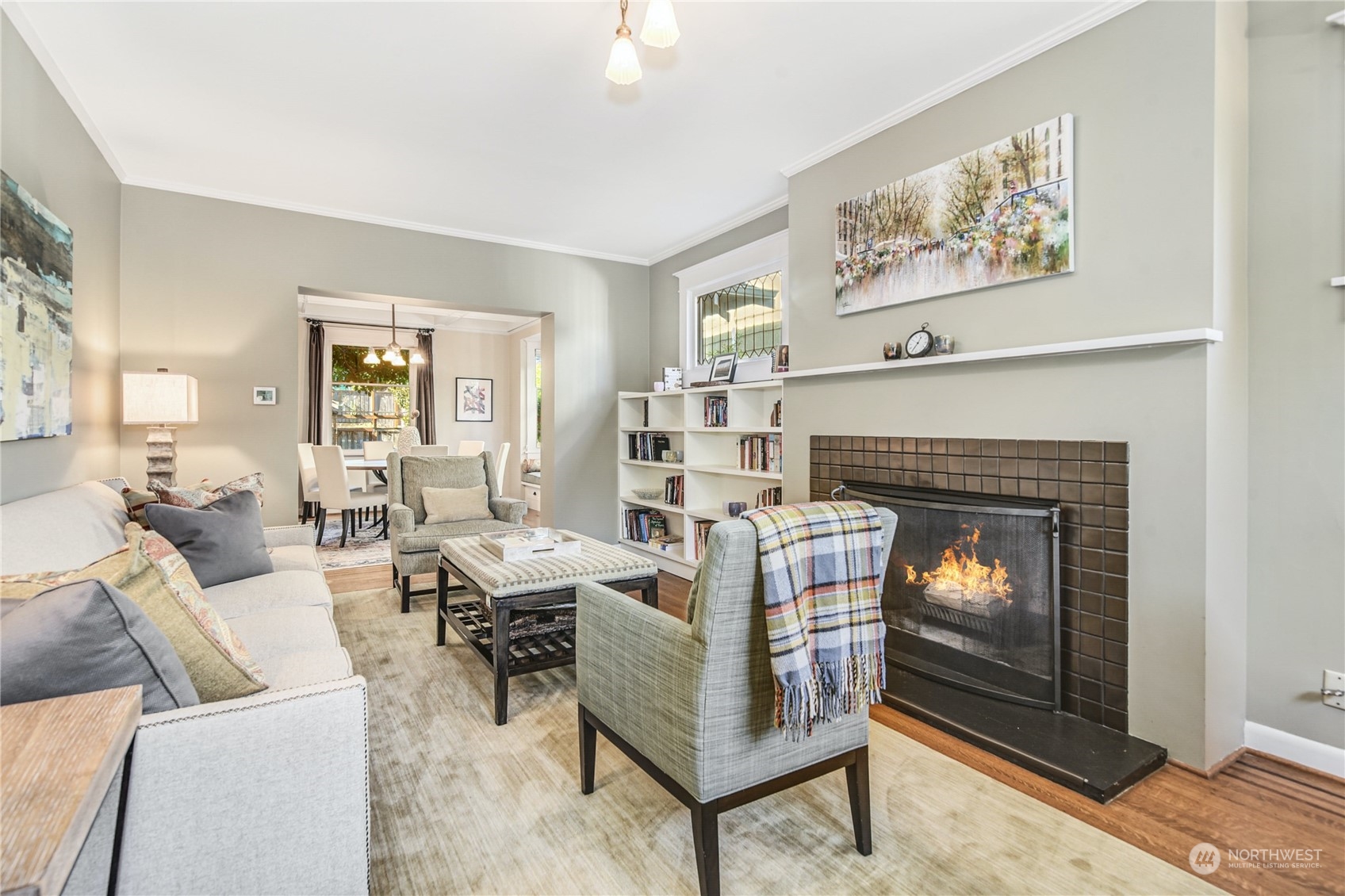 1249 18th Avenue East Seattle, WA 98112 - Photo 7 of 39 a living room with furniture a fireplace and a window