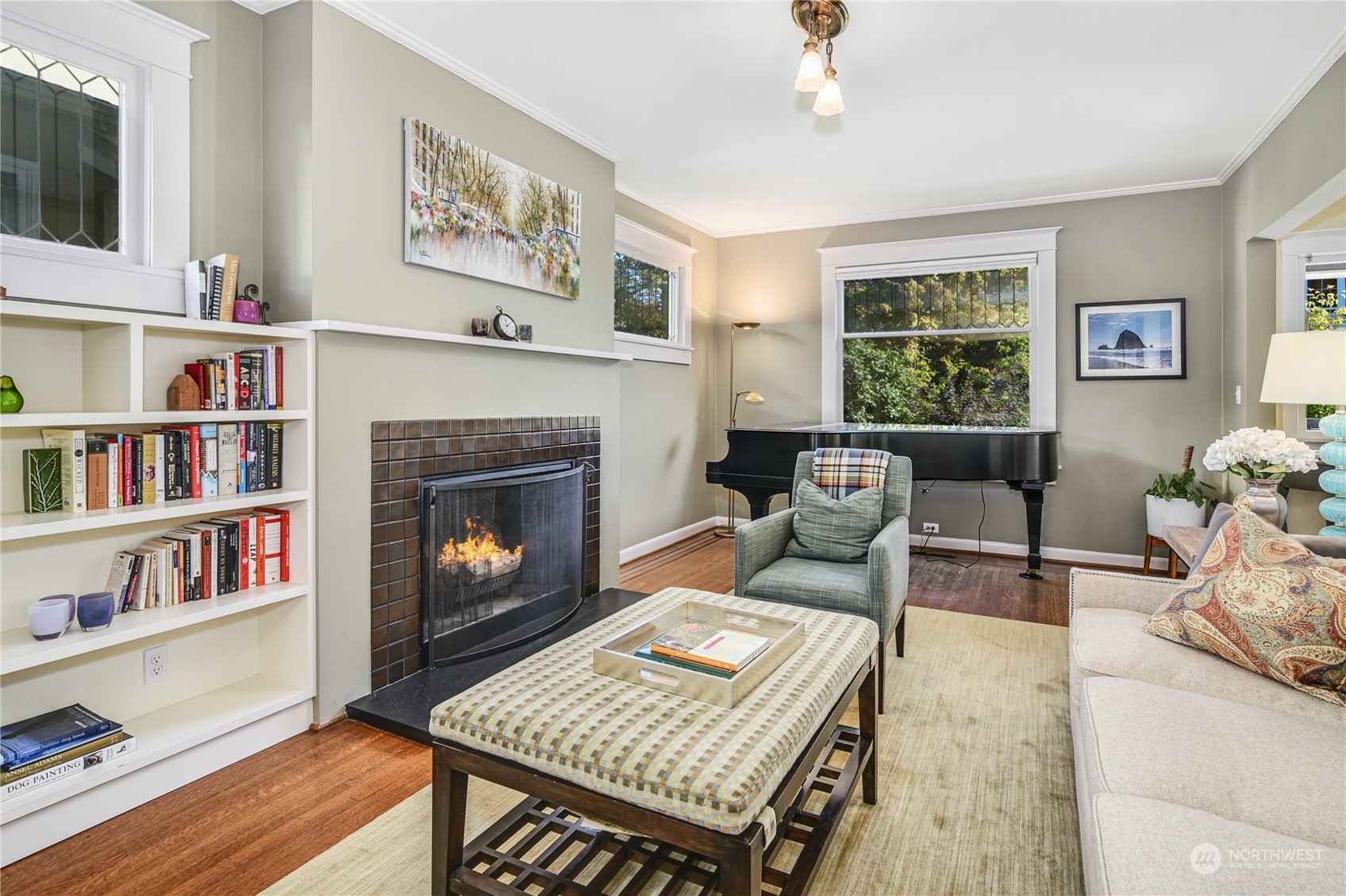 1249 18th Avenue East Seattle, WA 98112 - Photo 9 of 39 a living room with furniture and a fireplace