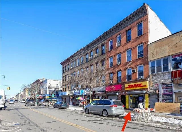 an aerial view of a city with lots of residential buildings