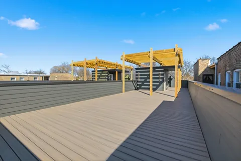 a view of a house with a terrace