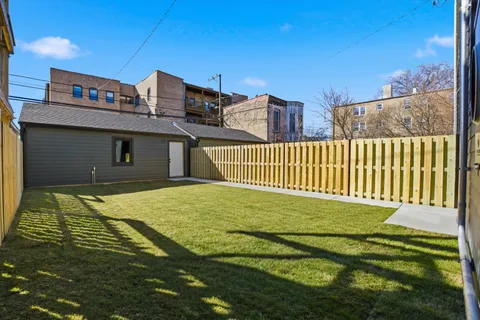 a house view with a backyard space