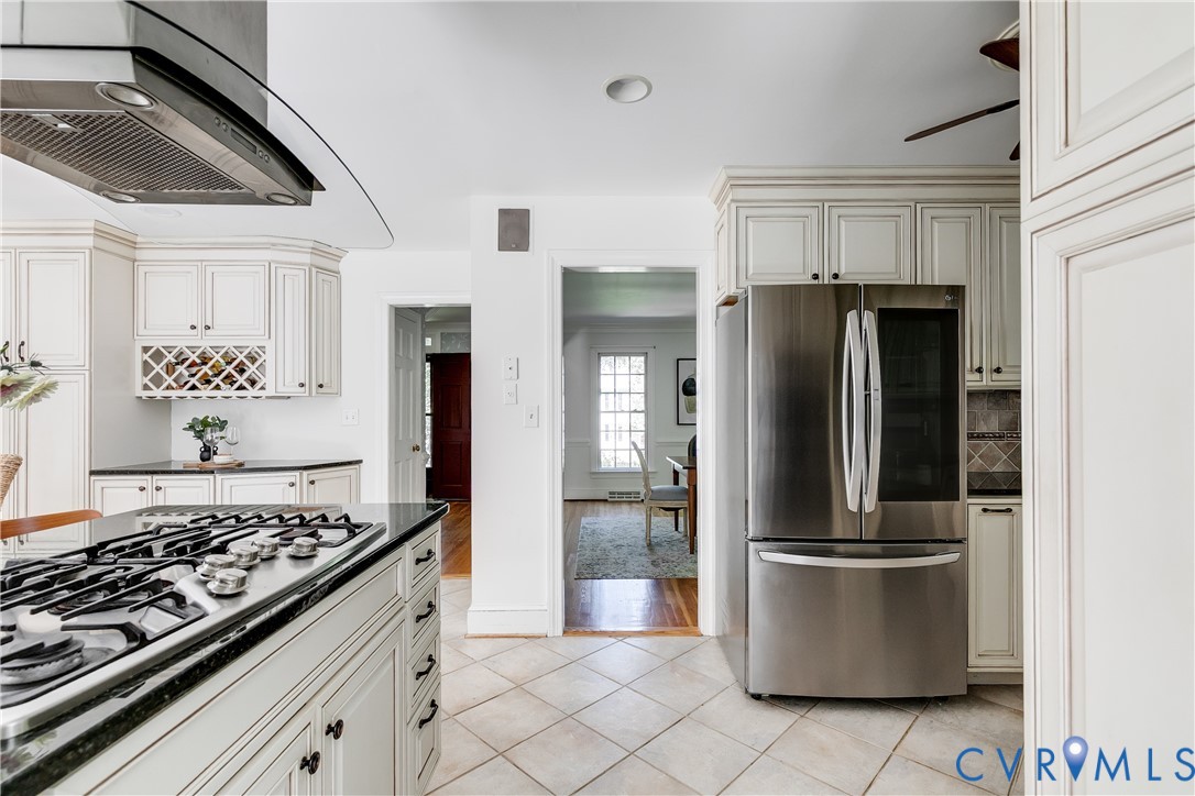 509 Wadeward Road Henrico, VA 23229 - Photo 17 of 59 a kitchen with stainless steel appliances granite countertop a refrigerator and a stove