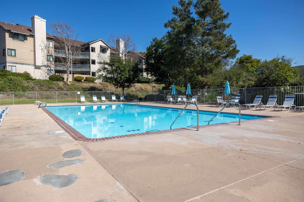 2910 Elm Tree Court Spring Valley, CA 91978 - Photo 20 of 27 a view of a house with a swimming pool