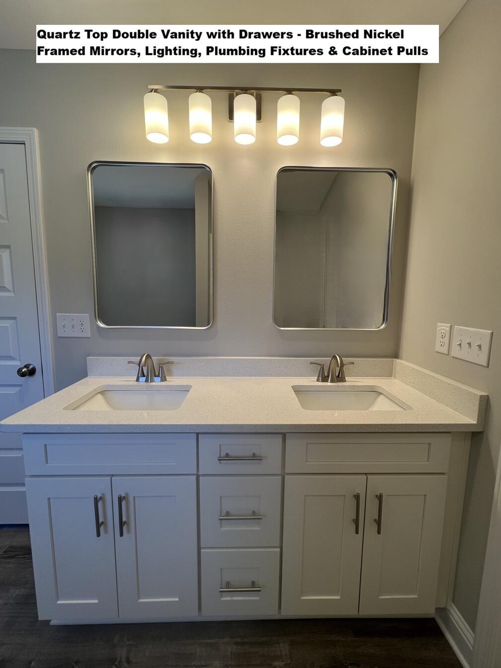 445 Scooter Cove Crestview, FL 32539 - Photo 12 of 22 a bathroom with a sink and a mirror