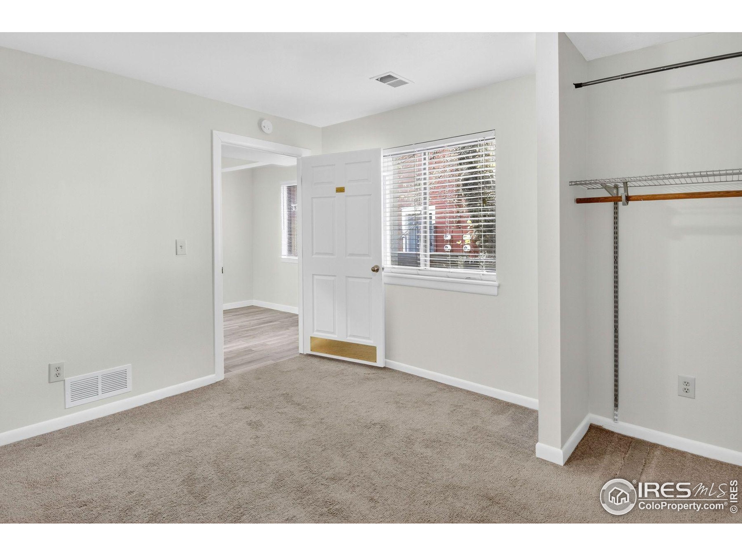 2317 Walnut Street Boulder, CO 80302 - Photo 12 of 34 a view of an empty room with a window