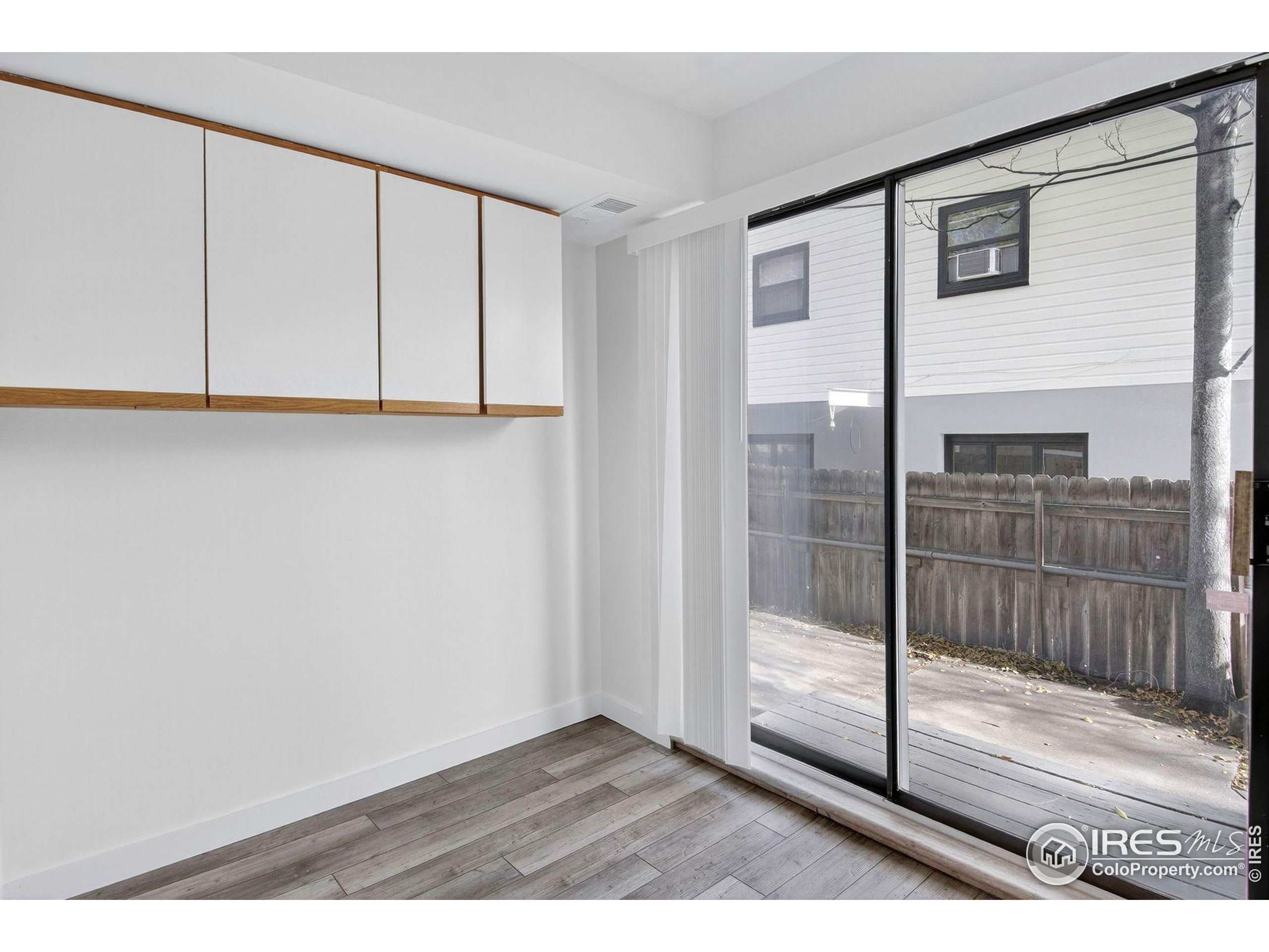 2317 Walnut Street Boulder, CO 80302 - Photo 14 of 34 a view of empty room with wooden floor