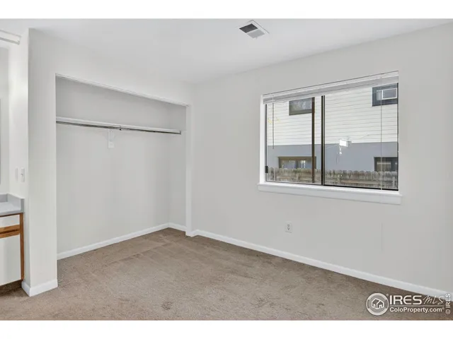 a bathroom with a toilet and a bath tub