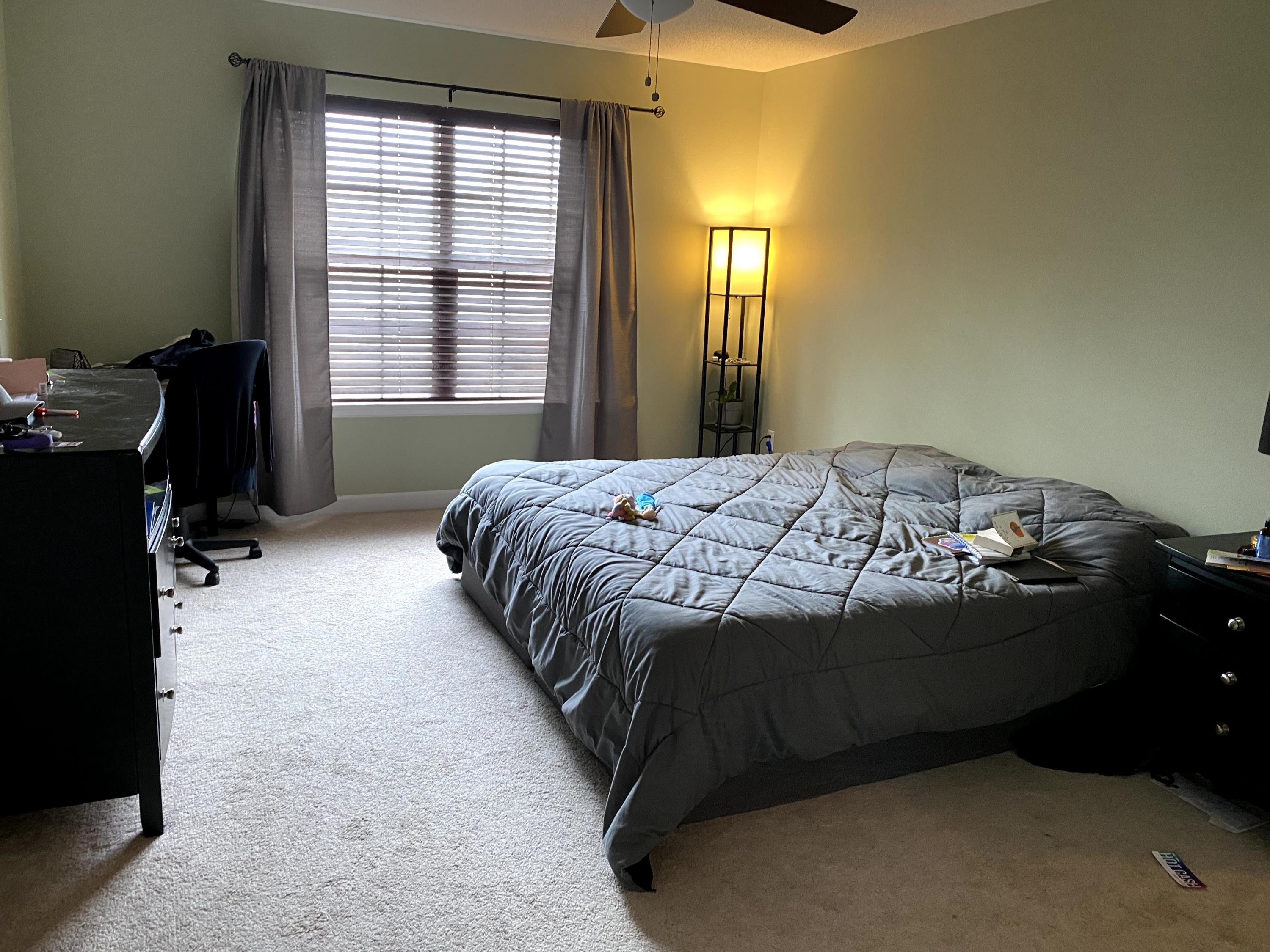 26 3rd Street Shalimar, FL 32579 - Photo 11 of 21 a bedroom with a bed and a window