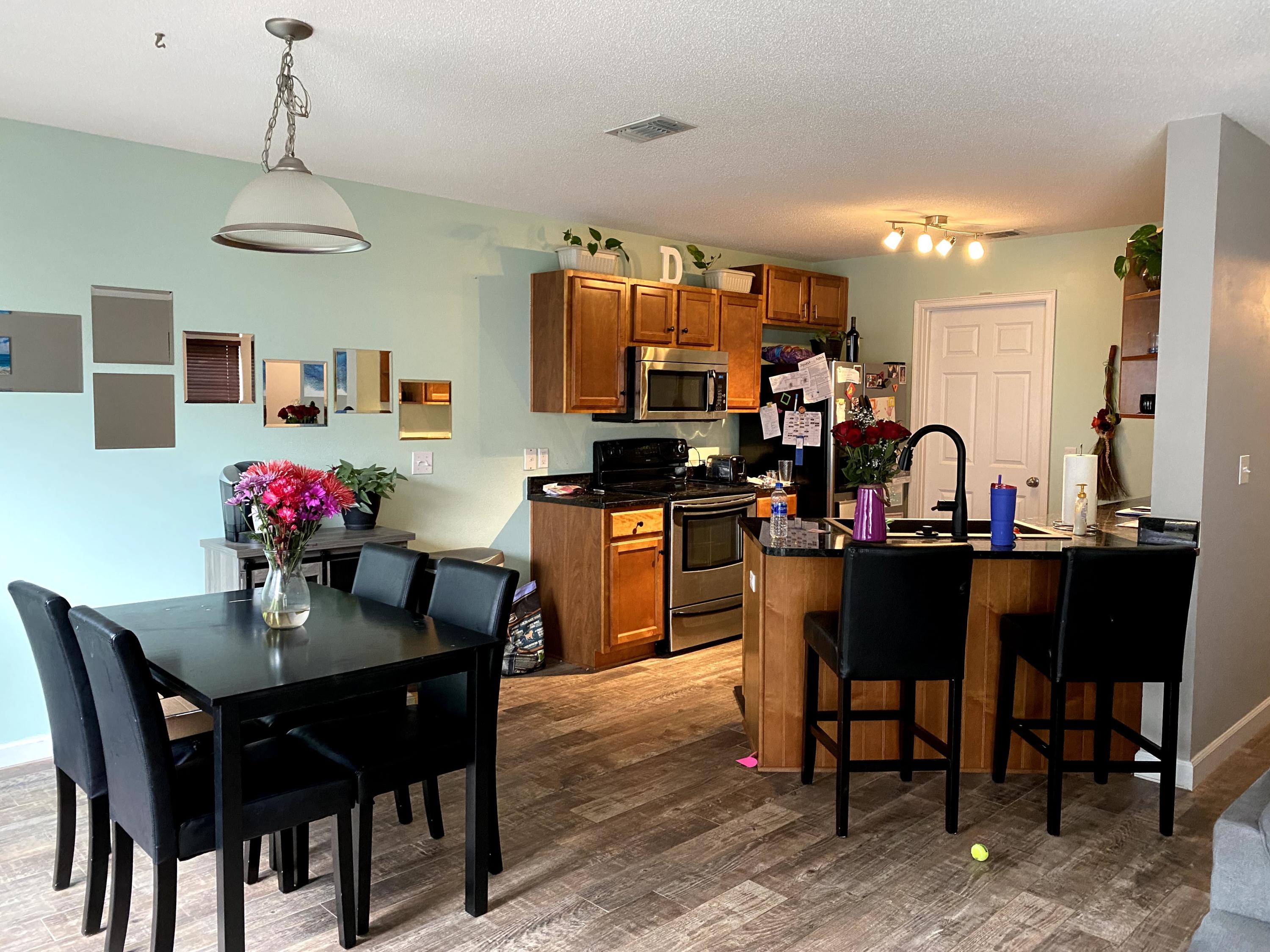 26 3rd Street Shalimar, FL 32579 - Photo 18 of 21 a dining room with furniture and chandelier