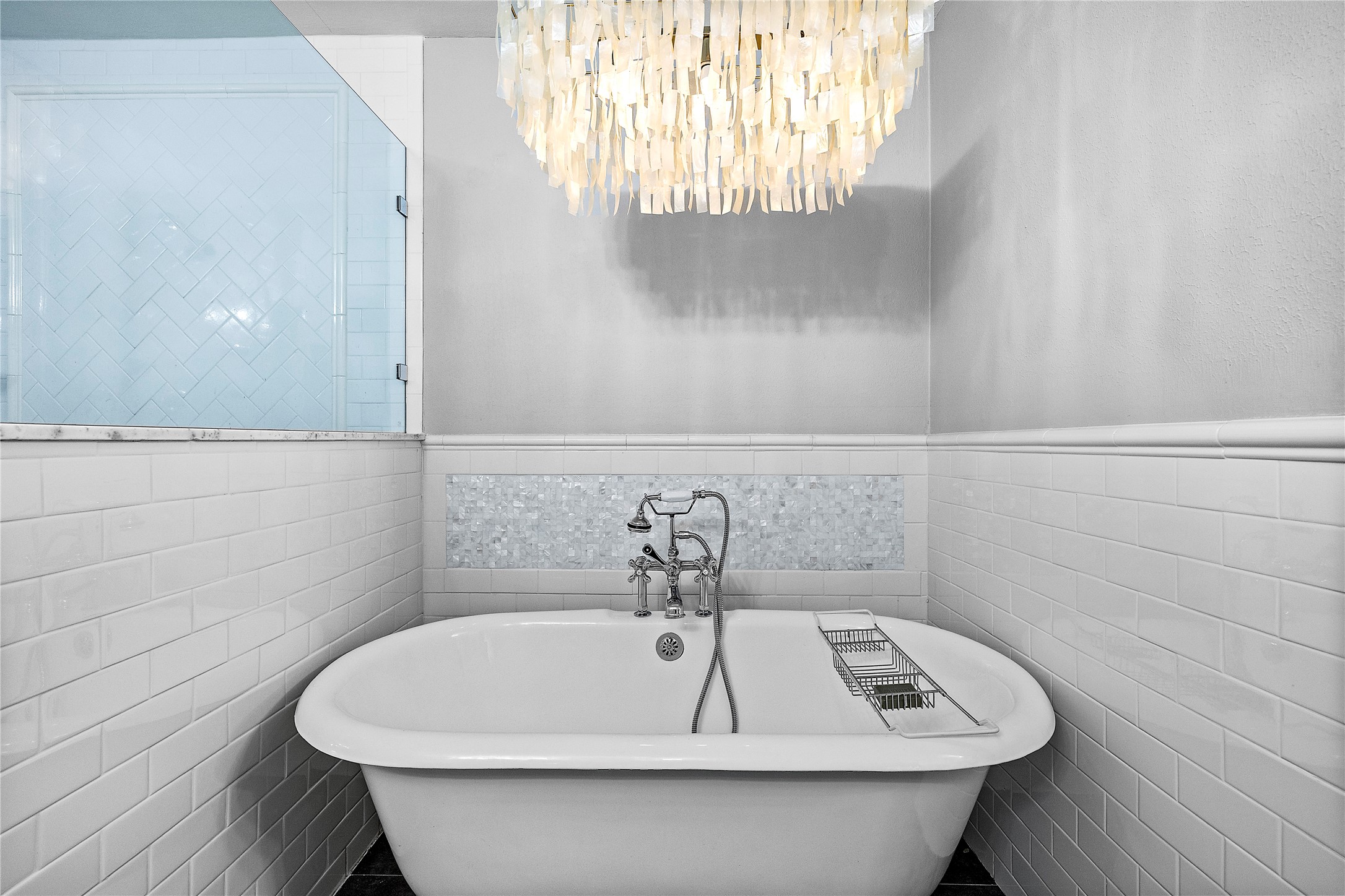 8422 Academy Street Houston, TX 77025 - Photo 21 of 47 a bathroom with a sink and bathtub