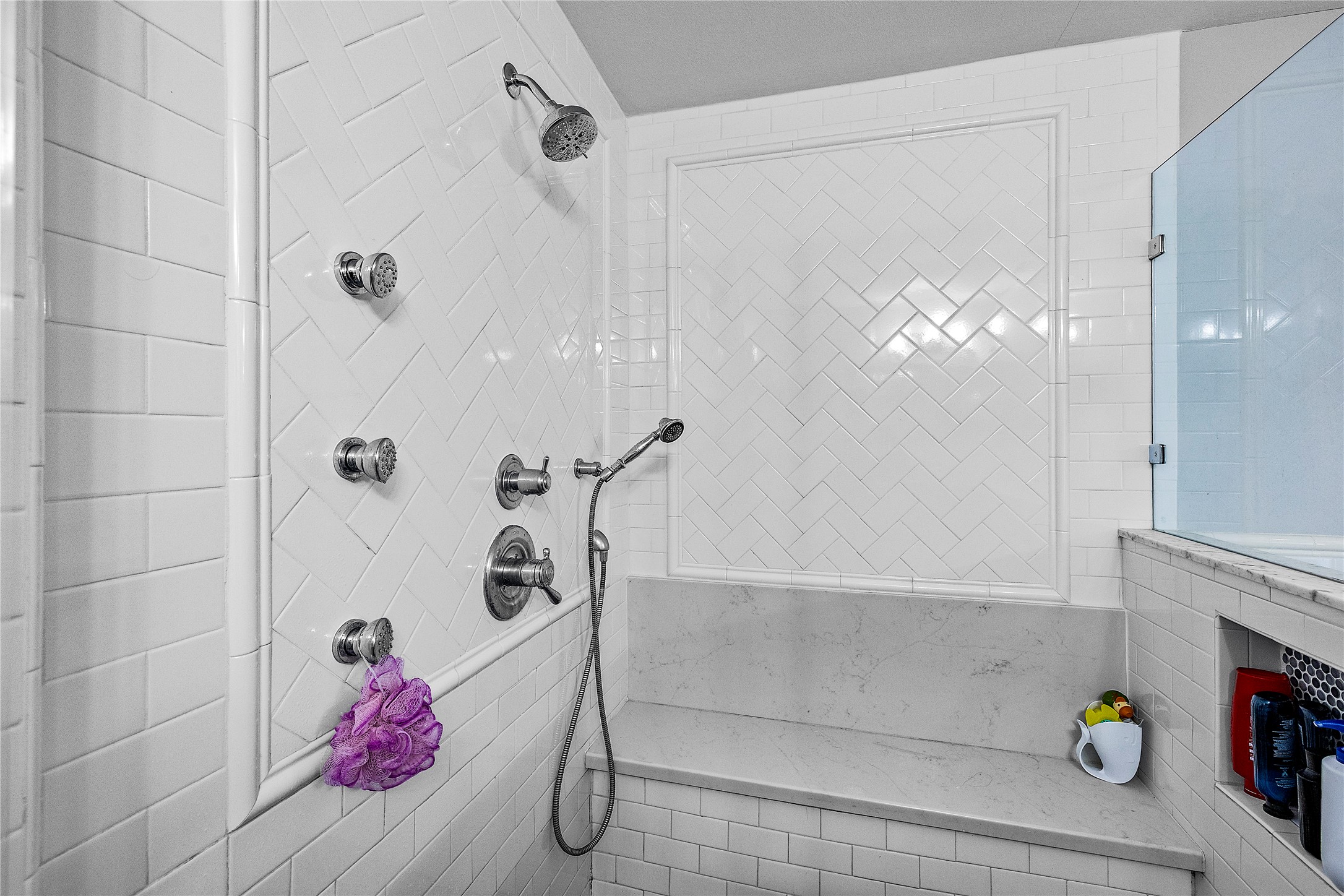 8422 Academy Street Houston, TX 77025 - Photo 22 of 47 a bathroom with a tub shower and window