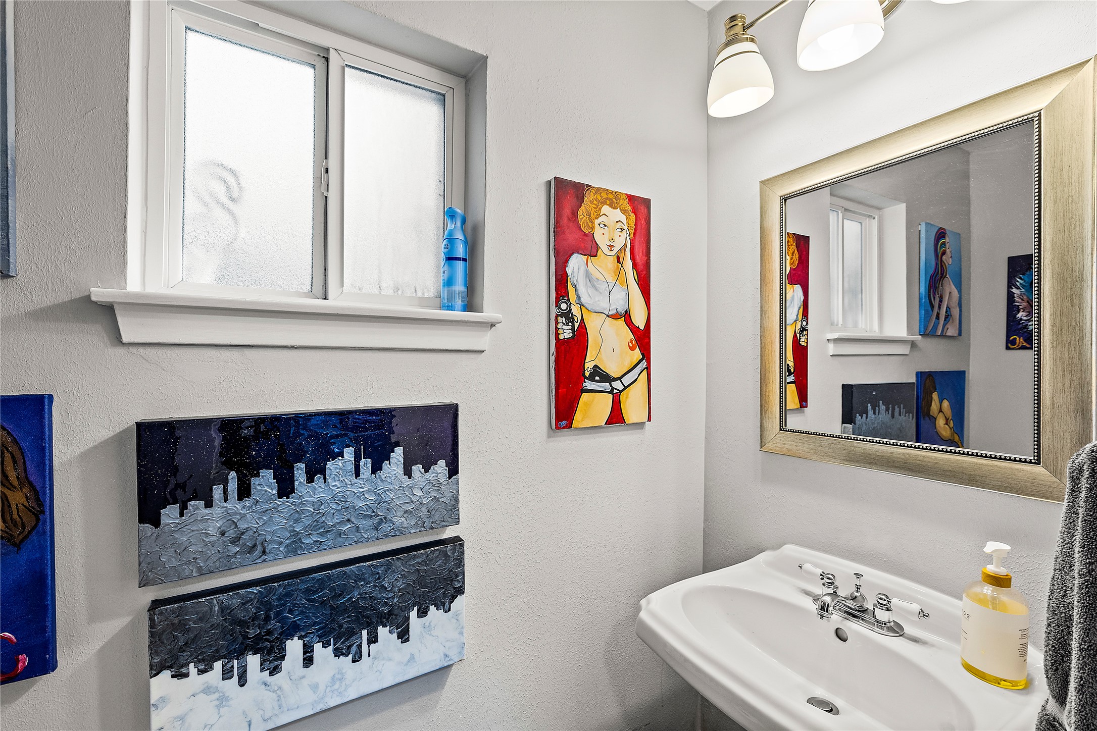 8422 Academy Street Houston, TX 77025 - Photo 35 of 47 A fun, colorful powder room that adds character to the home and easy access directly from the pool into the bathroom.